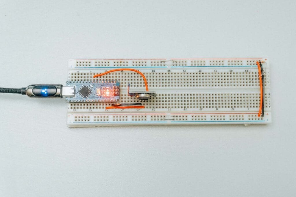Arduino Haptic Feedback Art: Arduino nano setup showcasing haptic feedback art, featuring tactile sensors and responsive actuators for a multisensory art experience.
