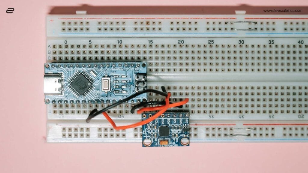 Arduino Nano microcontroller connected to an MPU6050 gyroscope and accelerometer sensor on a breadboard, ideal for motion sensing and DIY electronics projects.