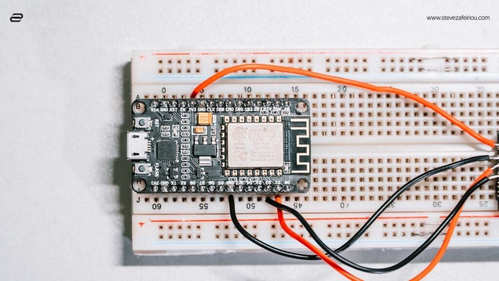 ESP8266 on a Breadboard for IoT Projects – A NodeMCU ESP8266 board mounted on a breadboard, commonly used for IoT healthcare projects, wireless data logging, and biometric sensor applications.