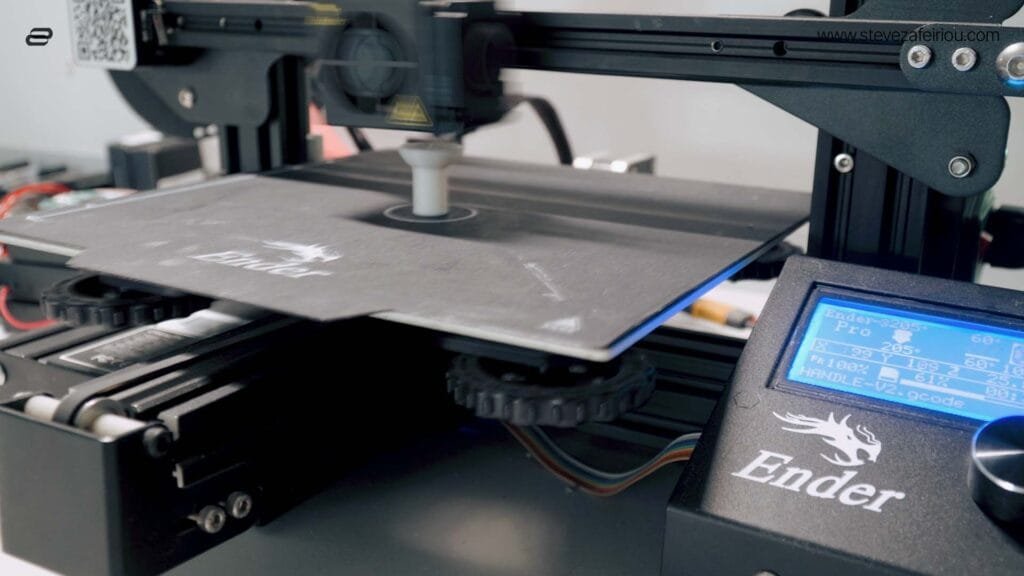 Ender 3 Pro 3D printer actively printing a joystick handle, demonstrating DIY custom parts creation for arcade gaming projects.