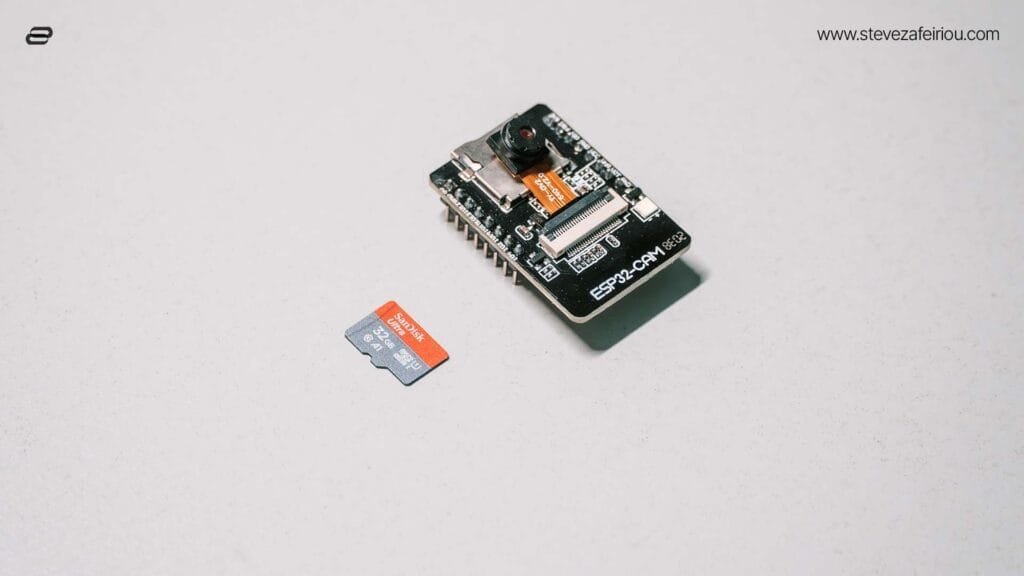 ESP32-CAM development board positioned next to a SanDisk MicroSD memory card, illustrating data storage compatibility.