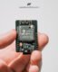 Close-up image of an ESP32-S WiFi and Bluetooth-enabled microcontroller chip from an ESP32-CAM module, ideal for embedded IoT solutions.