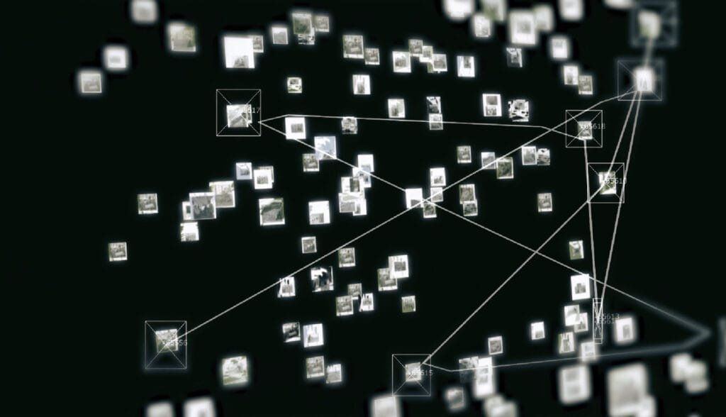 TouchDesigner-based digital visualization of a memory network with interconnected floating images and labeled nodes, representing synthetic memory reconstruction in a dark, immersive interface.
